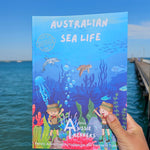 australian sea life activity book being held up