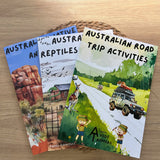 Three australian activity books on a wooden surface with Australian-themed content.