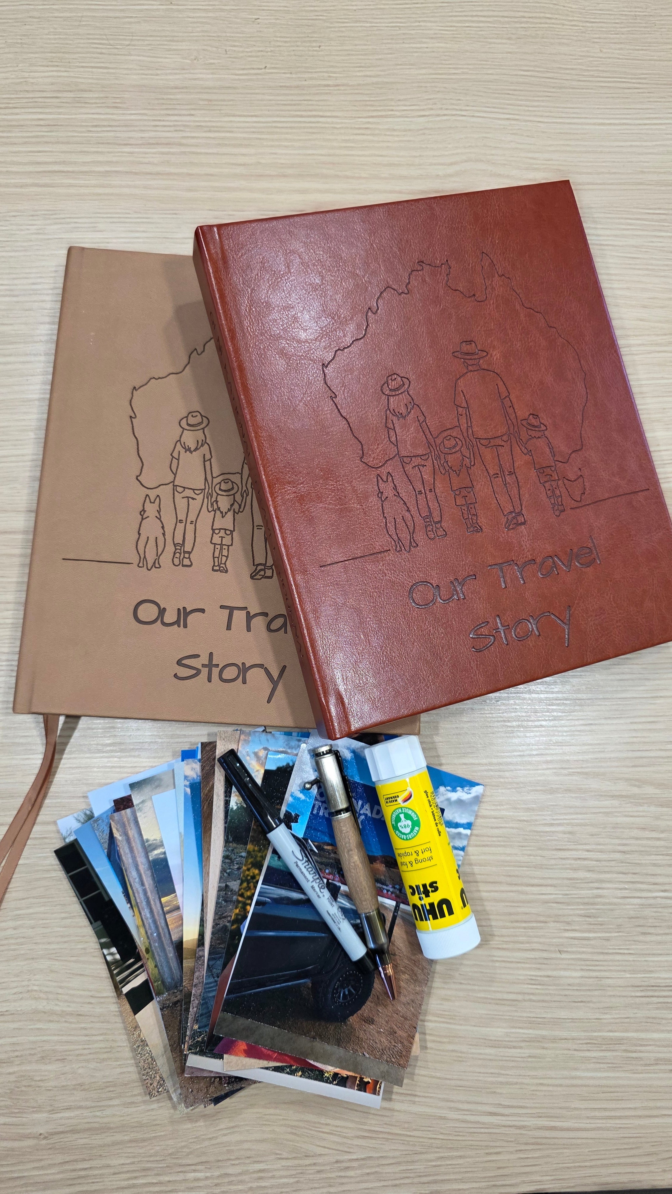 Two australian travel journals titled 'Our Travel Story' with travel photos, and journalling contents